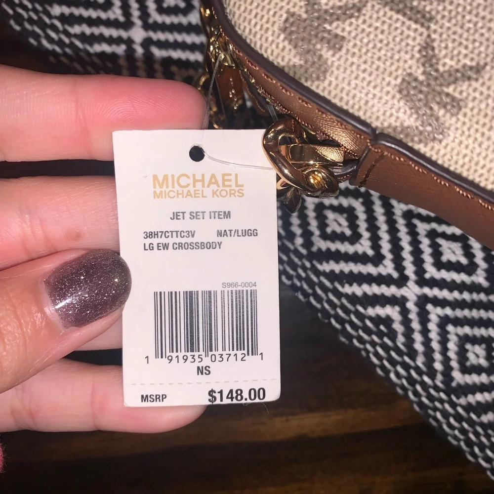 Crossbody is BRAND NEW WITH TAGS! - Picture 2 of 2